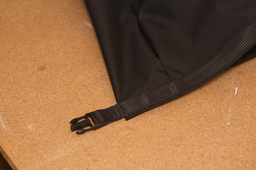 Webbing and buckle on the drybag closure
